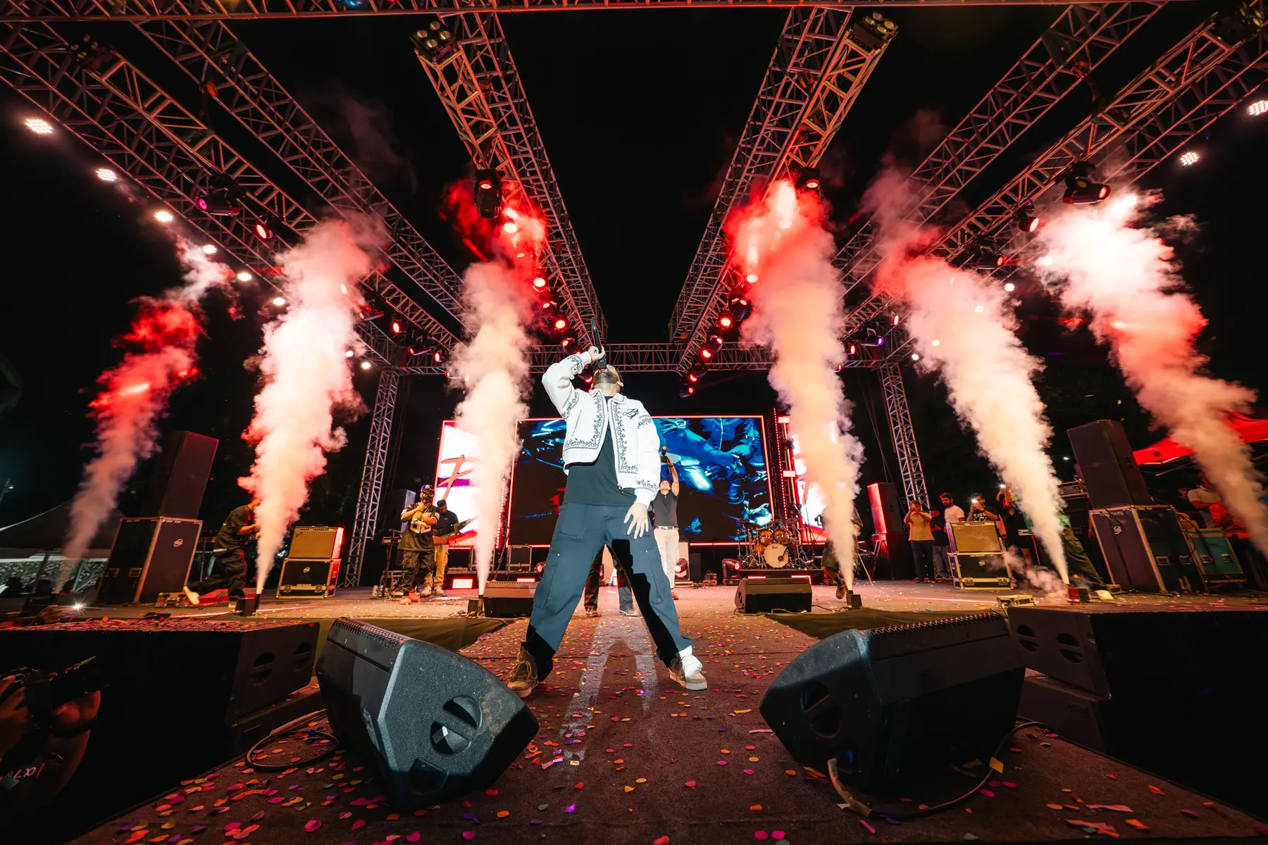 A performer between CO₂ jets on the Grub Fest stage
